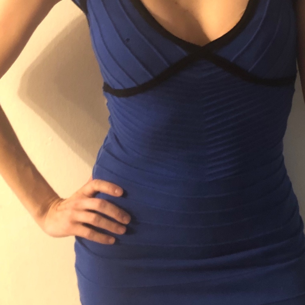 Low cut electric blue bandaid dress w/ black trim